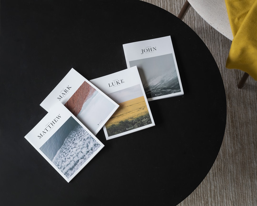 The Four Gospels on Black Coffee Table